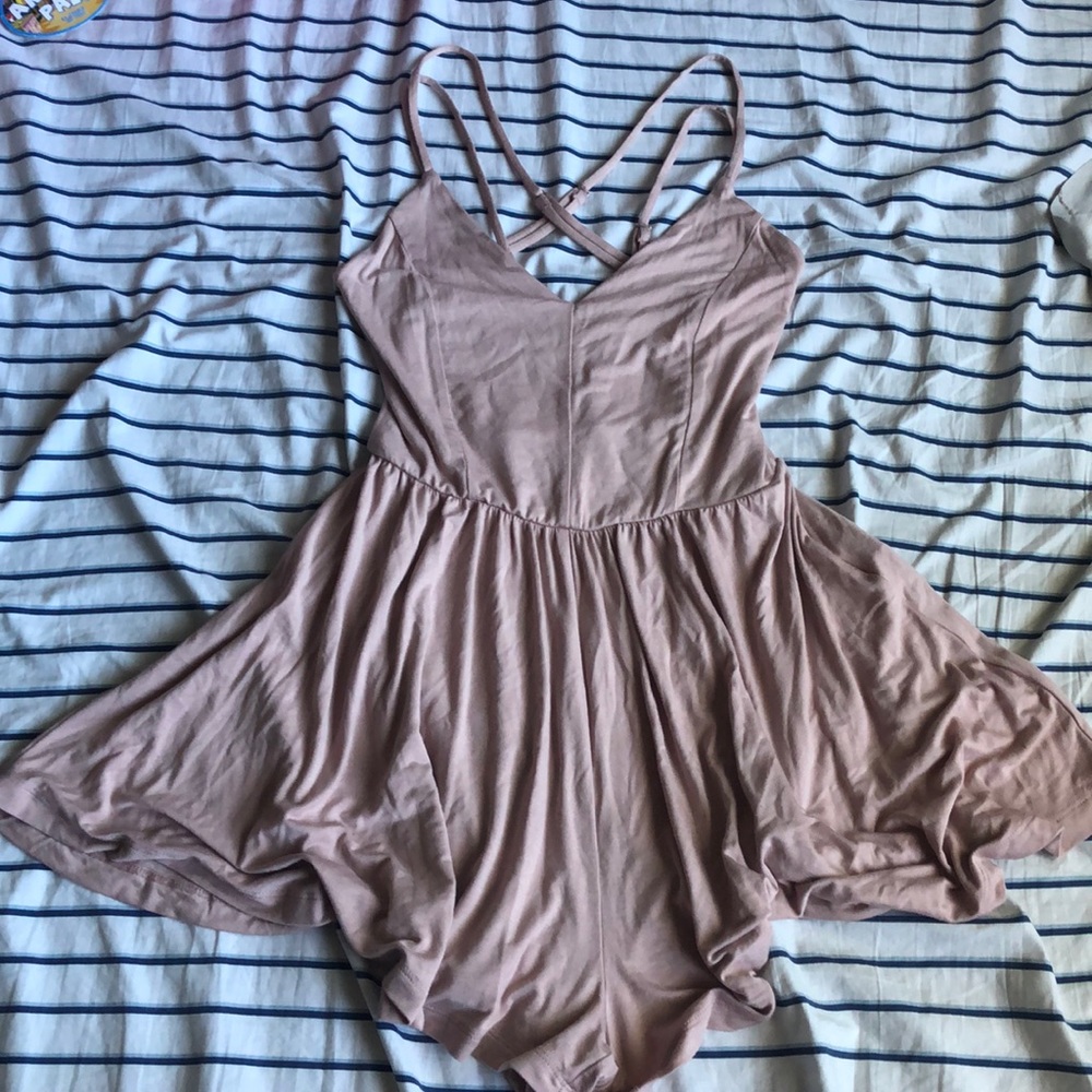 Pastel pink backless criss cross romper